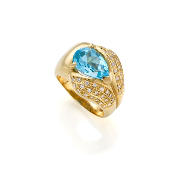 Gold ring with topaz and colourless gemstones  - Auction JEWELRY AND WATCHES - Faraone Casa d'Aste