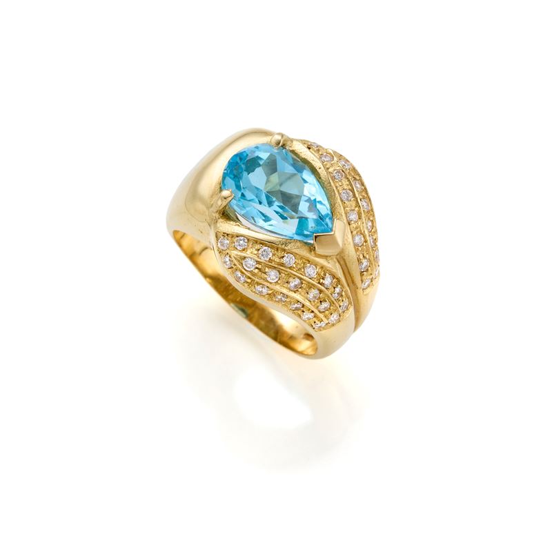 Anello in Oro con Topazio e Gemme Incolori