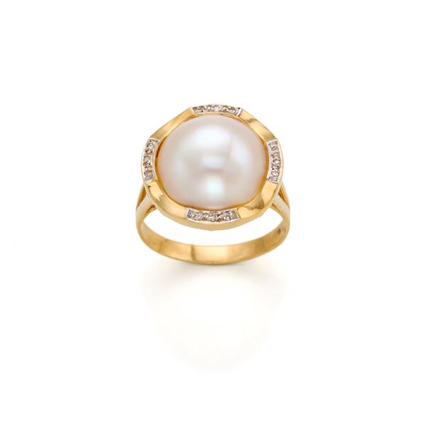 Anello in oro perla mabè