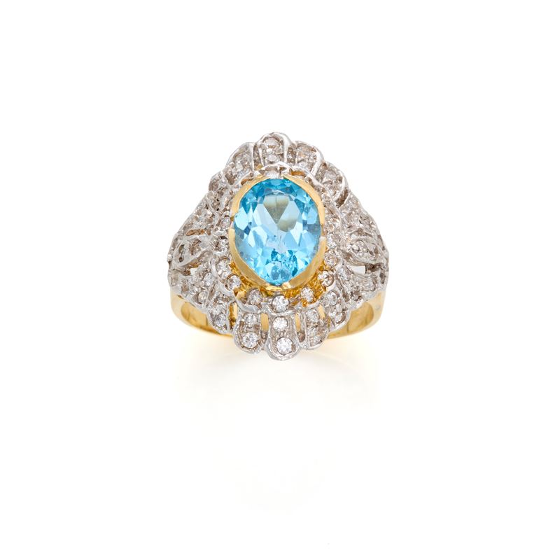 Anello in Oro con Topazio e Gemme Incolori