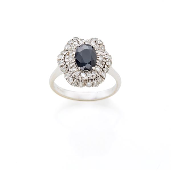 Anello in oro con zaffiro e diamanti