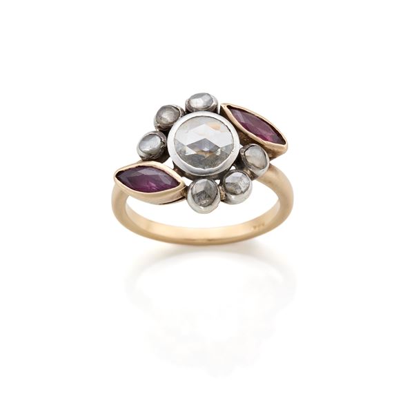 Anello in oro con diamanti e rubini