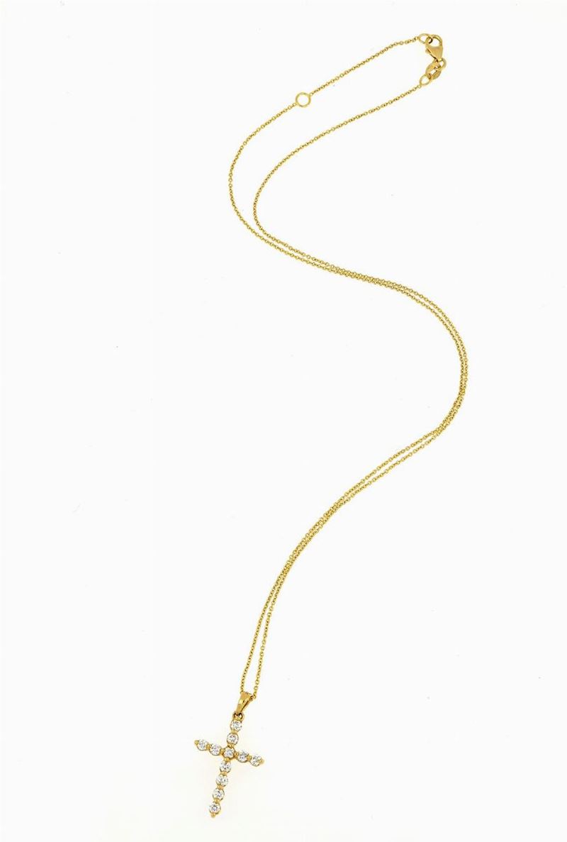 Pendente a Croce in Oro Giallo e Diamanti.