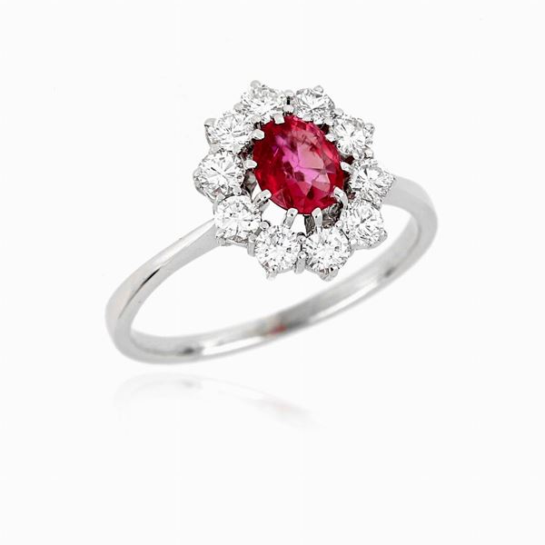 Anello in oro bianco con zaffiro rosa e diamanti